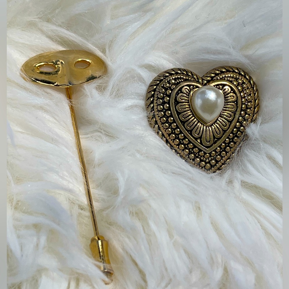 Mask pin and heart brooch